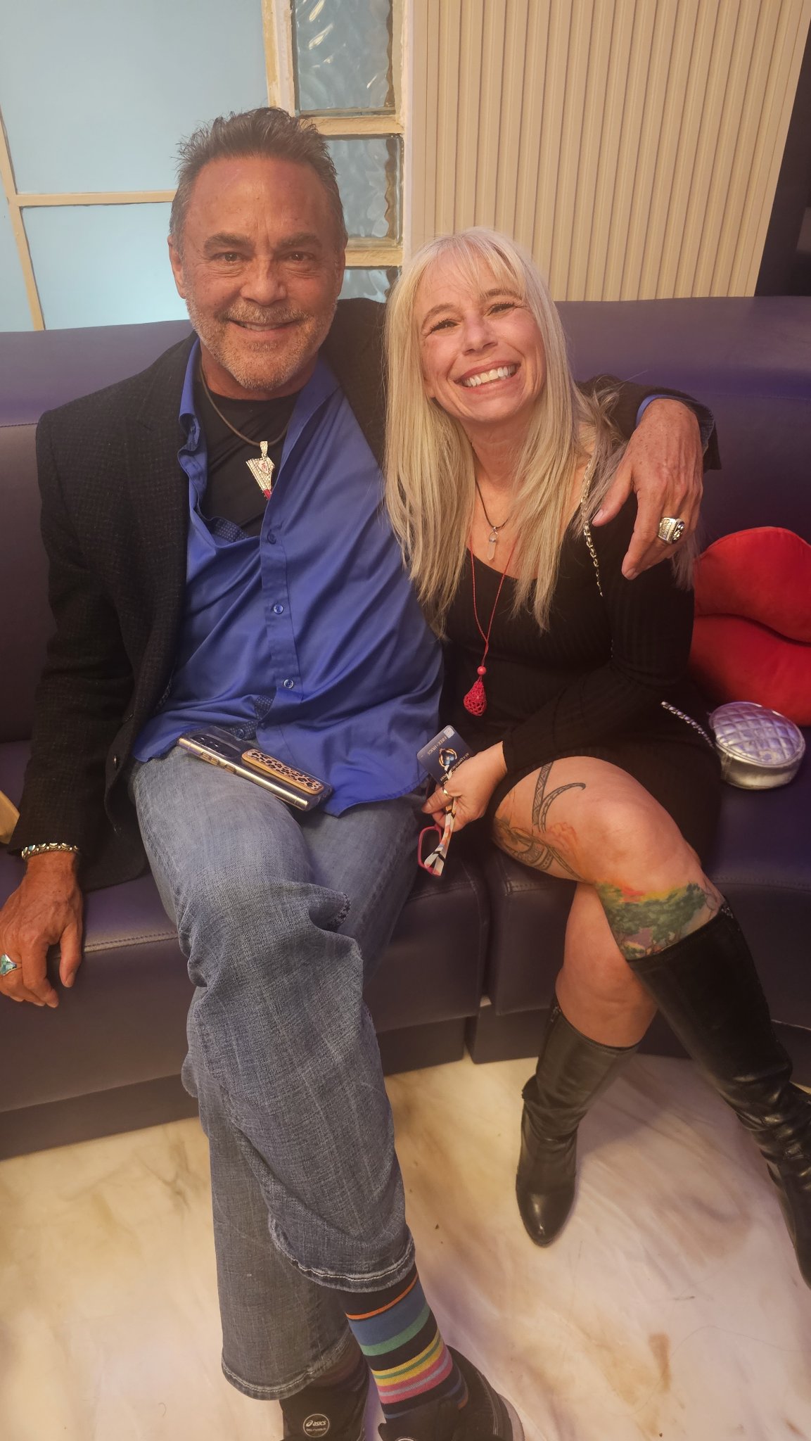 Angel Prater with her friend Nick Lowery, seated together
