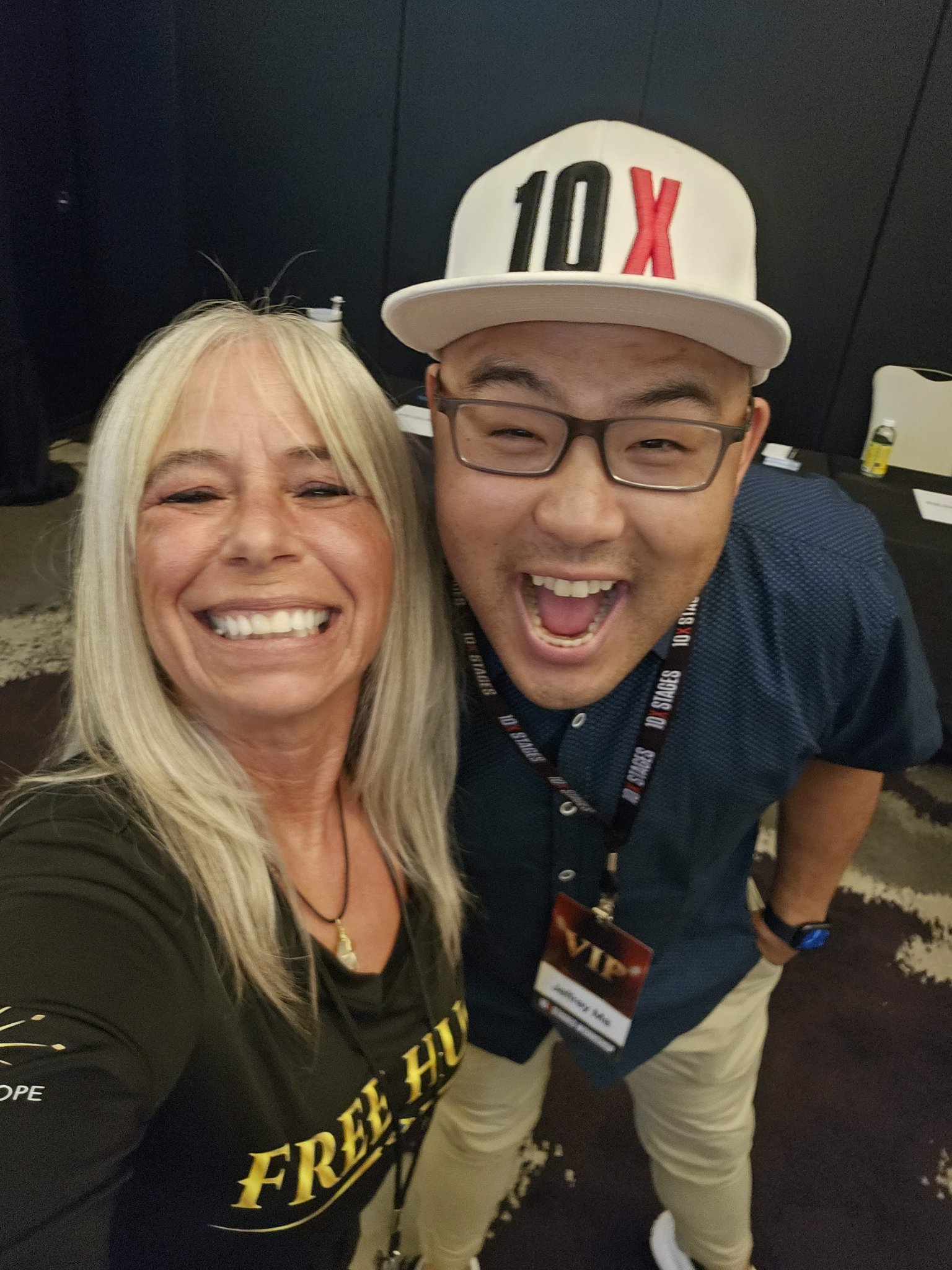 Angel Prater smiling in a selfie with a fellow attendee at 10X Stages